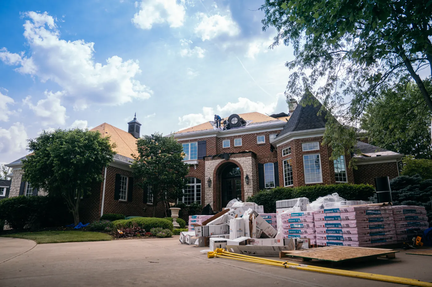 Tarping and dry-in on a Sweetbriar commercial roof